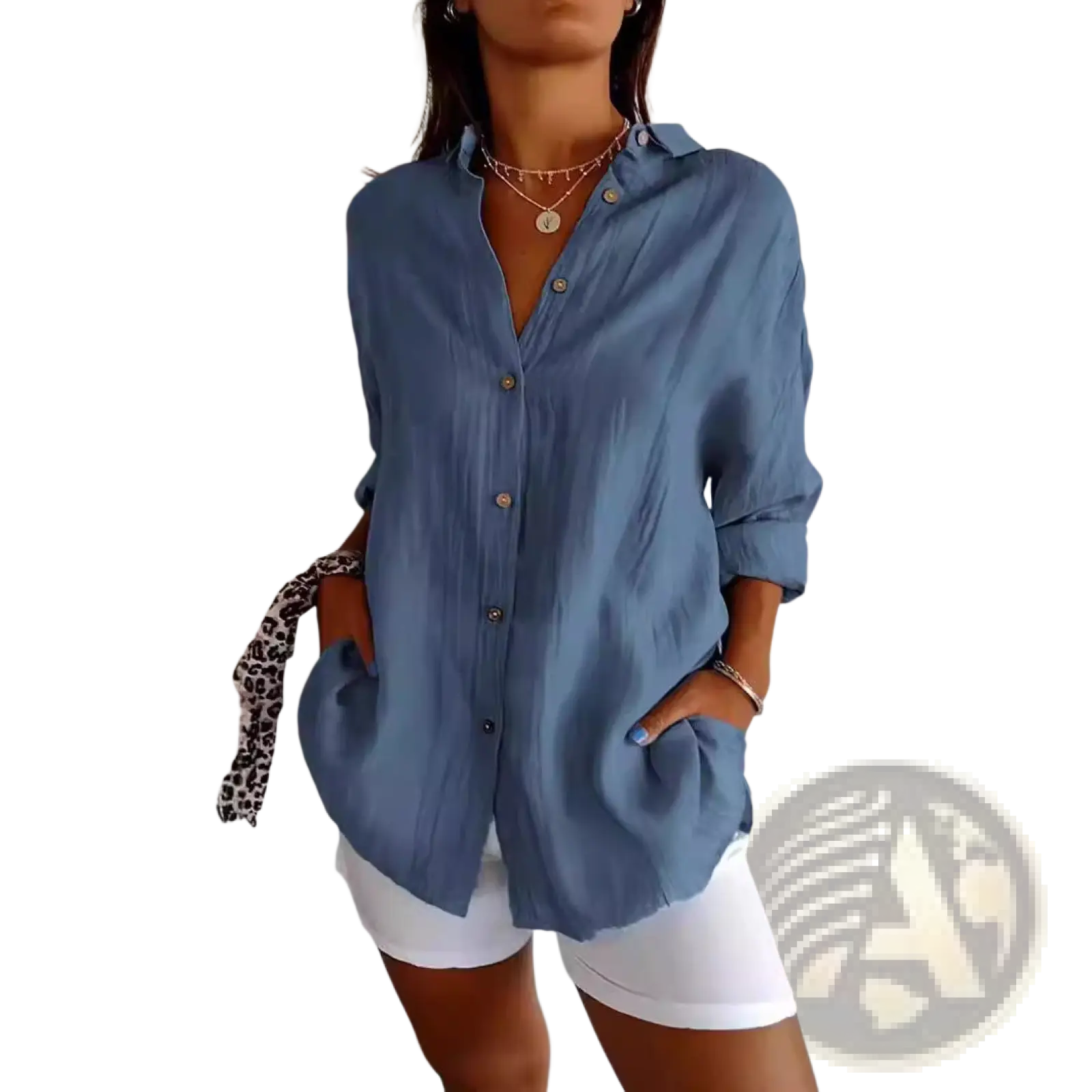 Blue women’s relaxed pleated button up shirt with rolled sleeves featuring a subtle textured fabric