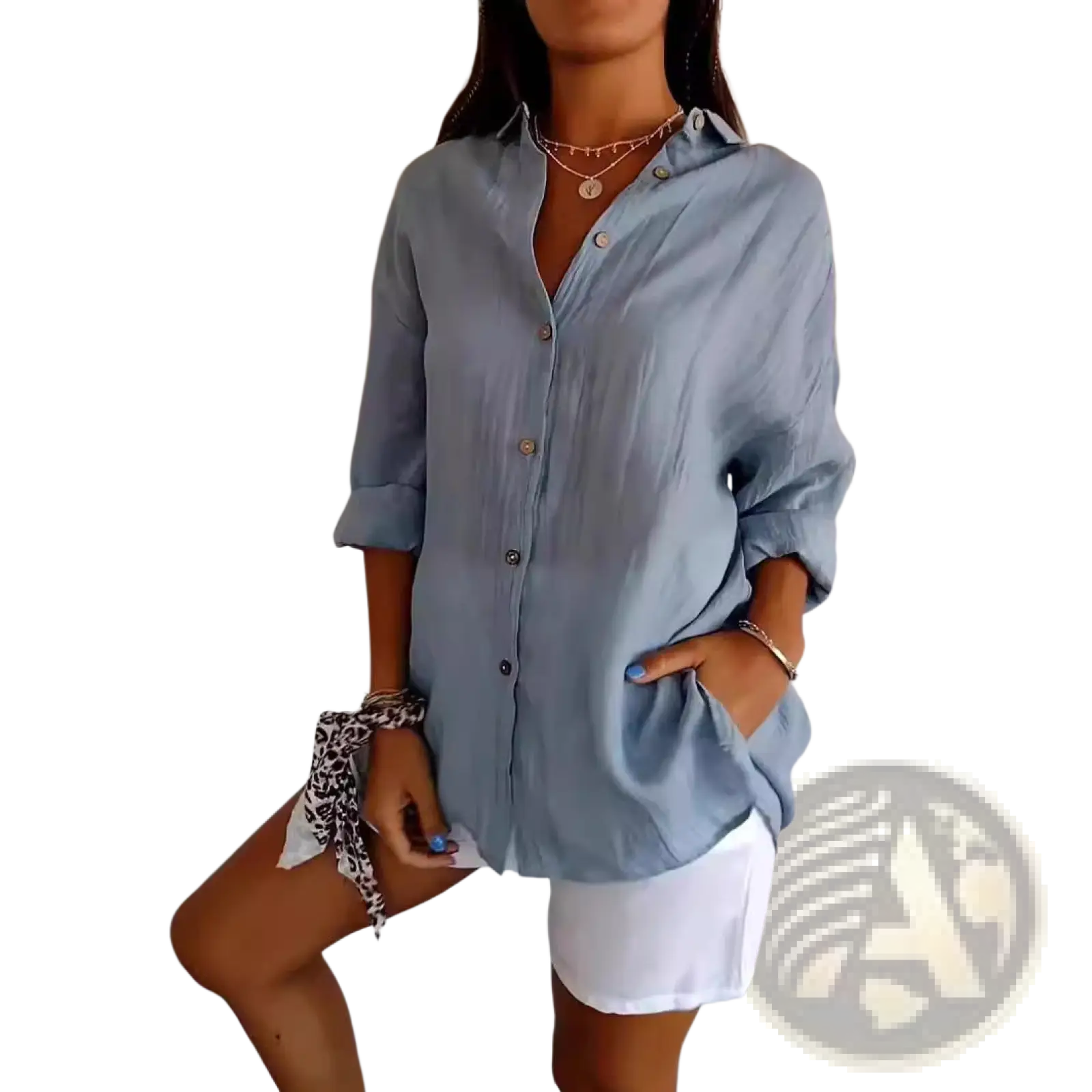 Light blue women’s relaxed pleated button up shirt with rolled sleeves and collar in loose-fitting fabric