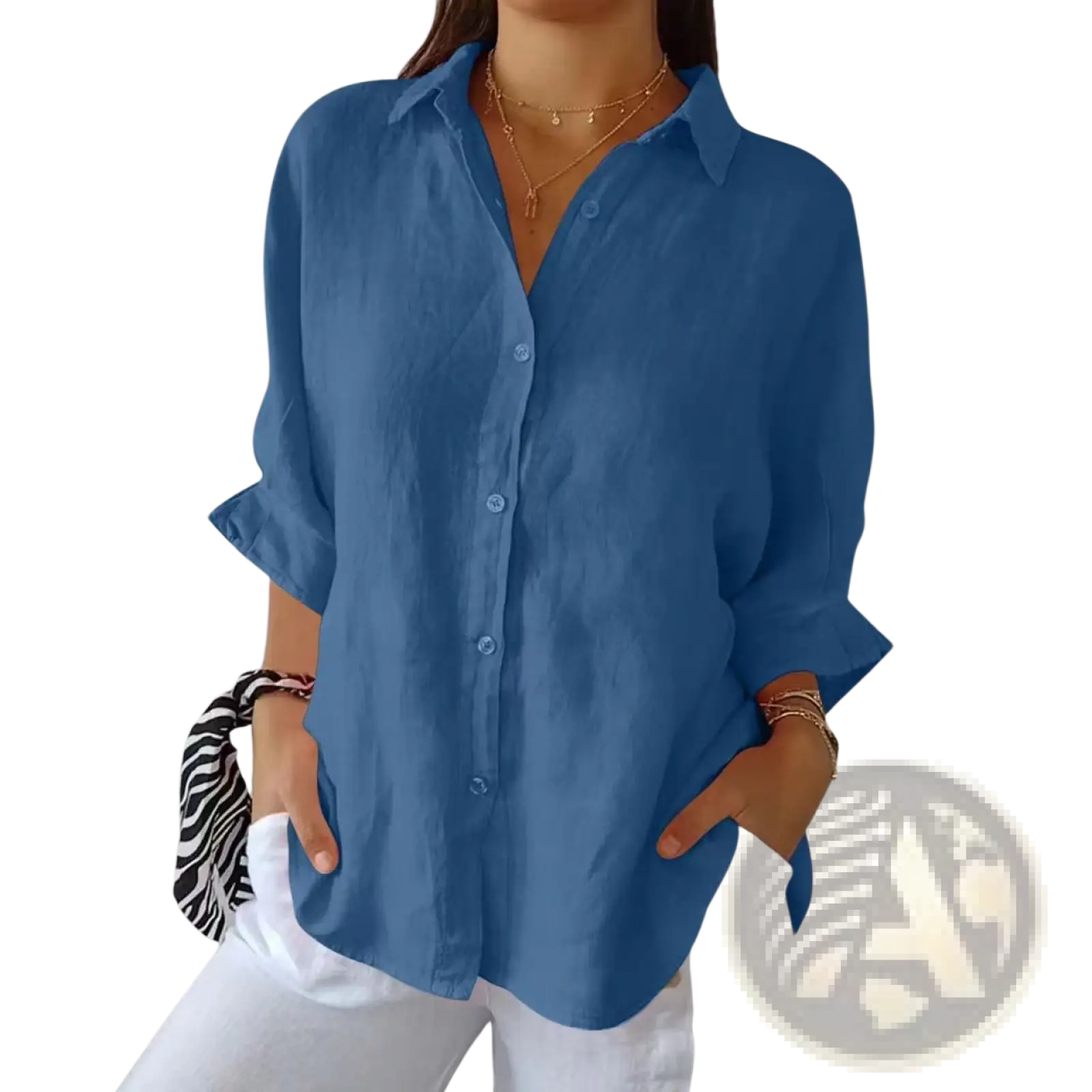 Women’s relaxed blue button-up shirt with pleats and rolled sleeves featuring a comfortable fit