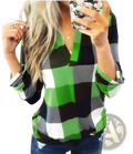 Women’s relaxed v neck plaid flannel tunic top in green black and white with long sleeves and rolled-up cuffs