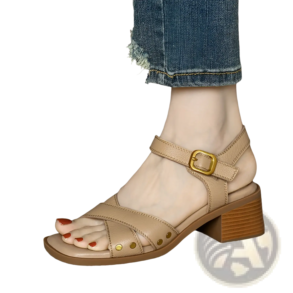 Beige leather women’s retro French mid heel sandals with gold-tone buckle, decorative studs, and chunky wooden heel