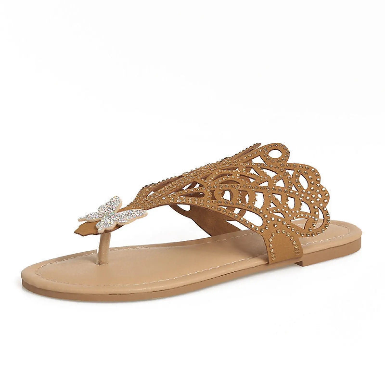 Beige women’s rhinestone hollow flat slip on sandal with intricate cutout design and butterfly accent on toe strap