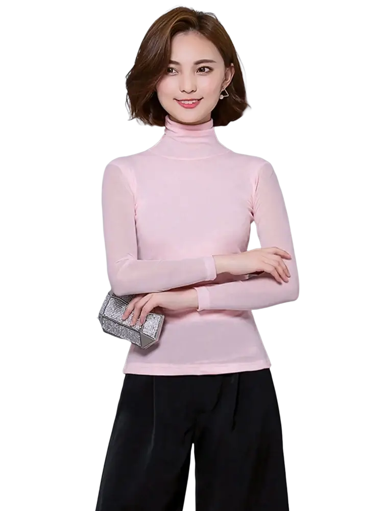Women’s sheer mesh turtleneck long sleeve blouse in soft pink with a sheer overlay fabric detail