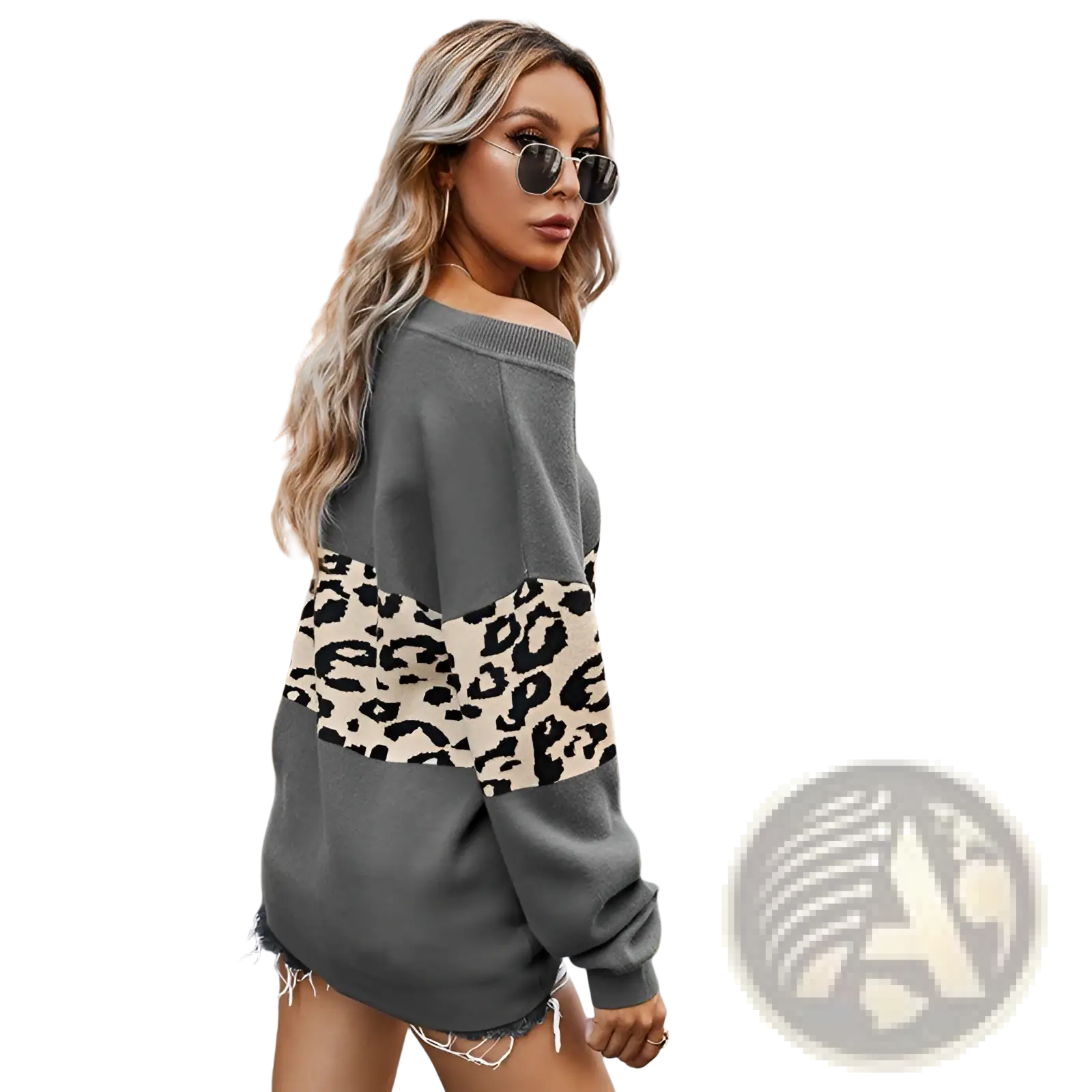 A women’s off shoulder gray sweatshirt with a bold leopard print panel and frayed hem details
