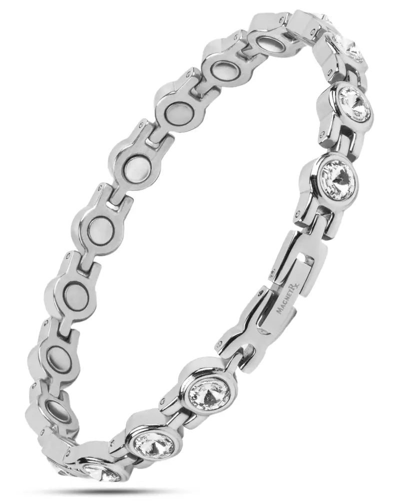 Women’s silver crystal magnetic therapy tennis bracelet with alternating circular links and embedded clear crystals