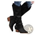 Black suede women’s knight boots with knee-high design low block heel and perforated buckle strap detailing