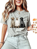 Gray women’s short sleeve t-shirt featuring Halloween dog graphic of three dogs dressed as mummy ghost and skeleton