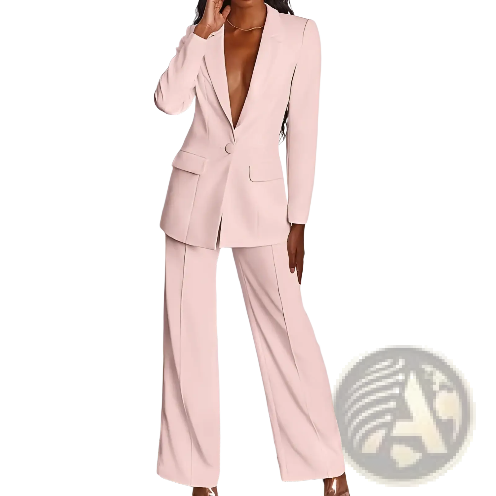A sleek blush pink women’s tailored blazer and wide-leg trouser suit set designed for a polished professional look