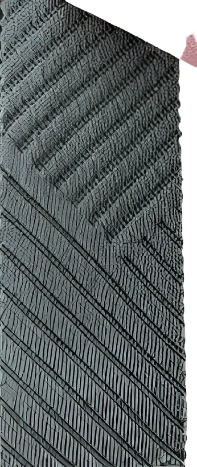 Close-up of a dark teal textured knit buttoned long sleeve hoodie showing diagonal ribbed fabric detail
