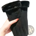 Women’s thermal touch screen winter cycling gloves in black with plush fuzzy lining and textured outer material shown from back side