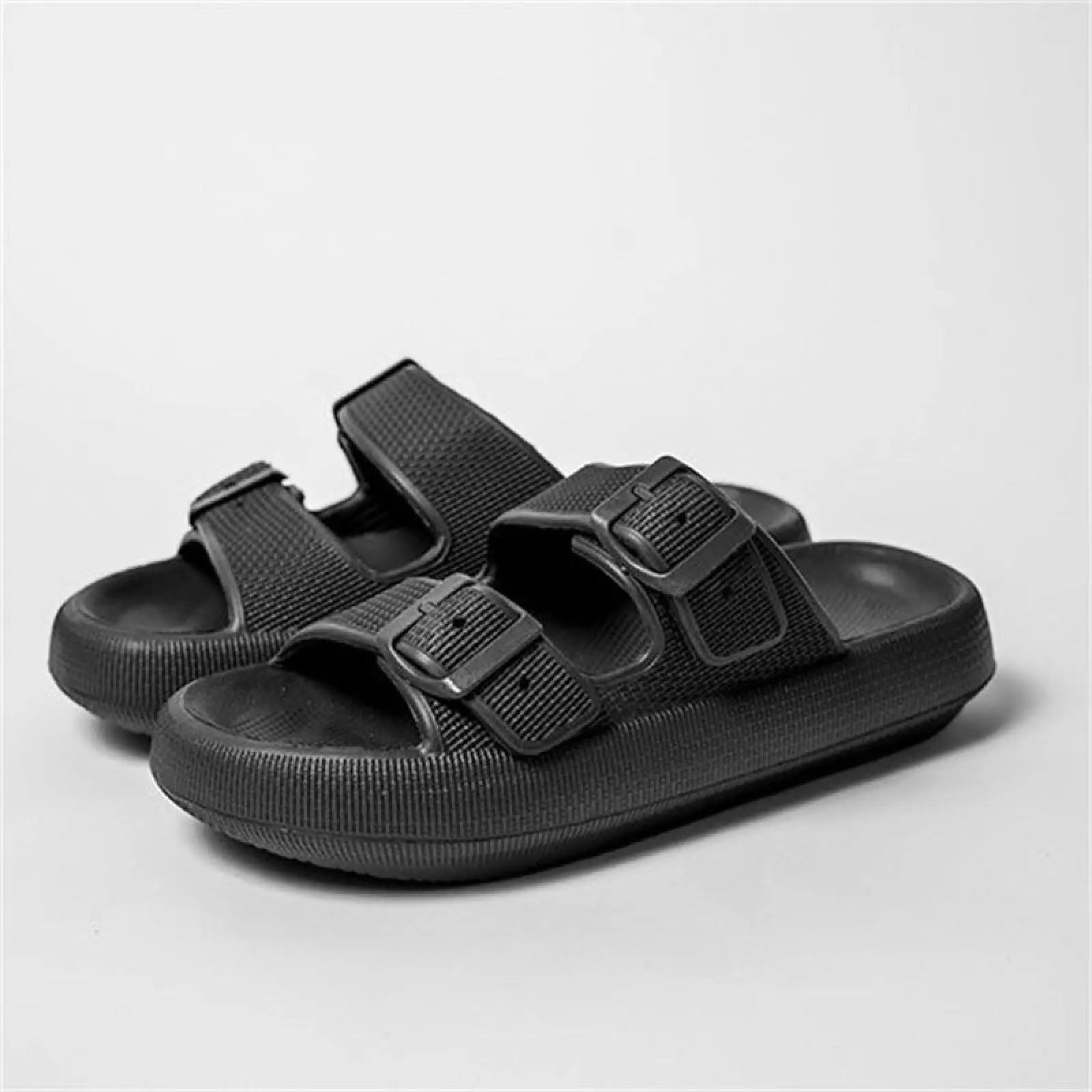 Black women’s dual-strap slide sandals with breathable textured fabric upper and thick sole eva rubber massage outsole