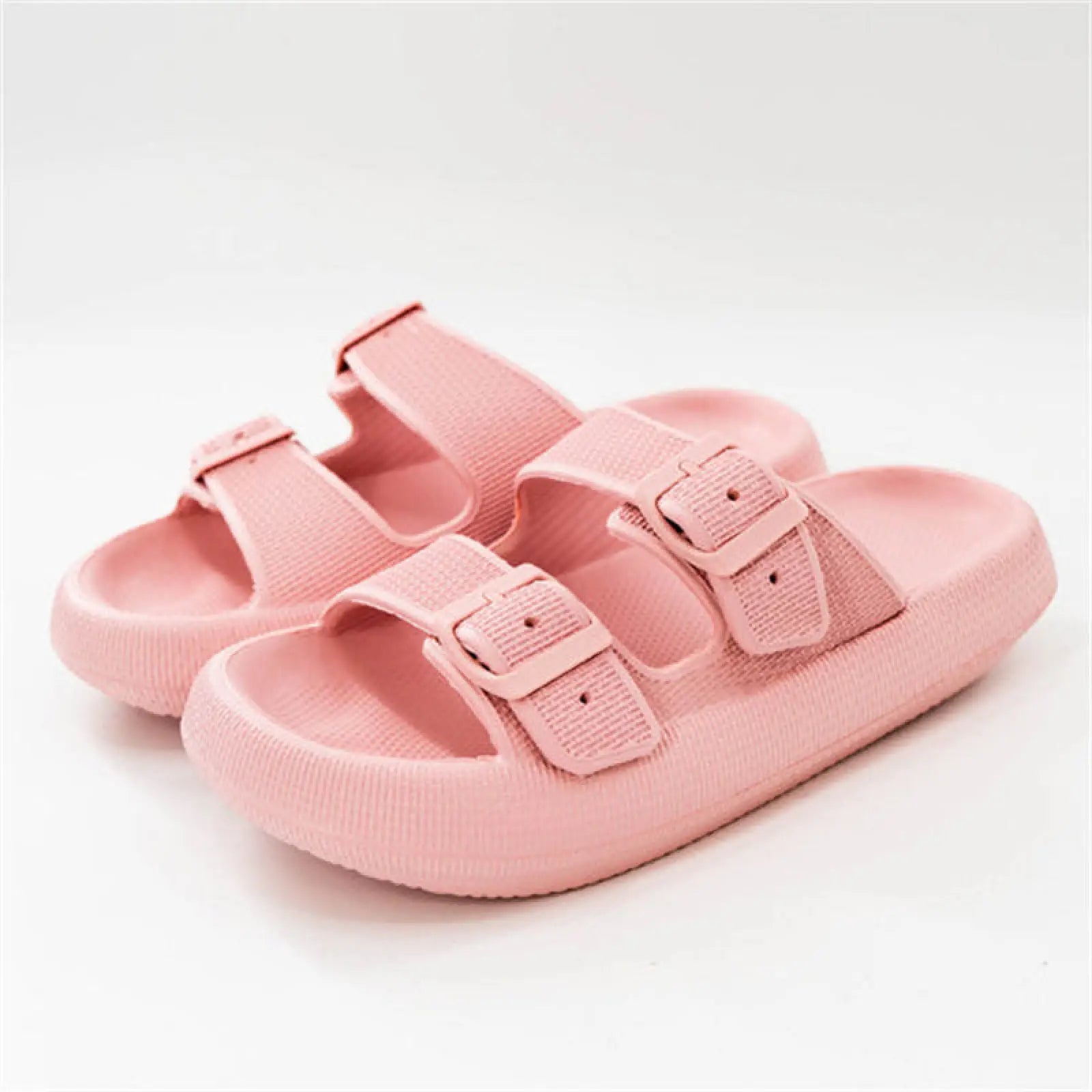 Pink rubber women’s thick sole breathable EVA massage slide sandals with two adjustable straps and buckle closures