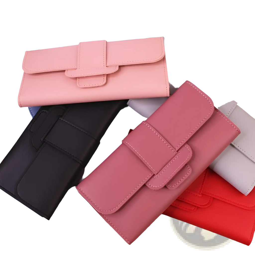 A collection of women’s tri fold leather clutch wallets with card slots in soft pink black and red faux leather finish