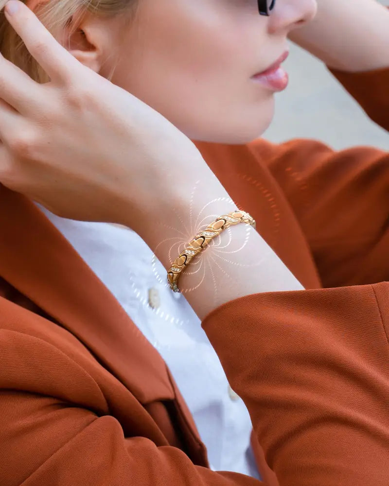 Women’s rose gold magnetic crystal xo link bracelet with a gold-toned intricately linked sleek elegant design