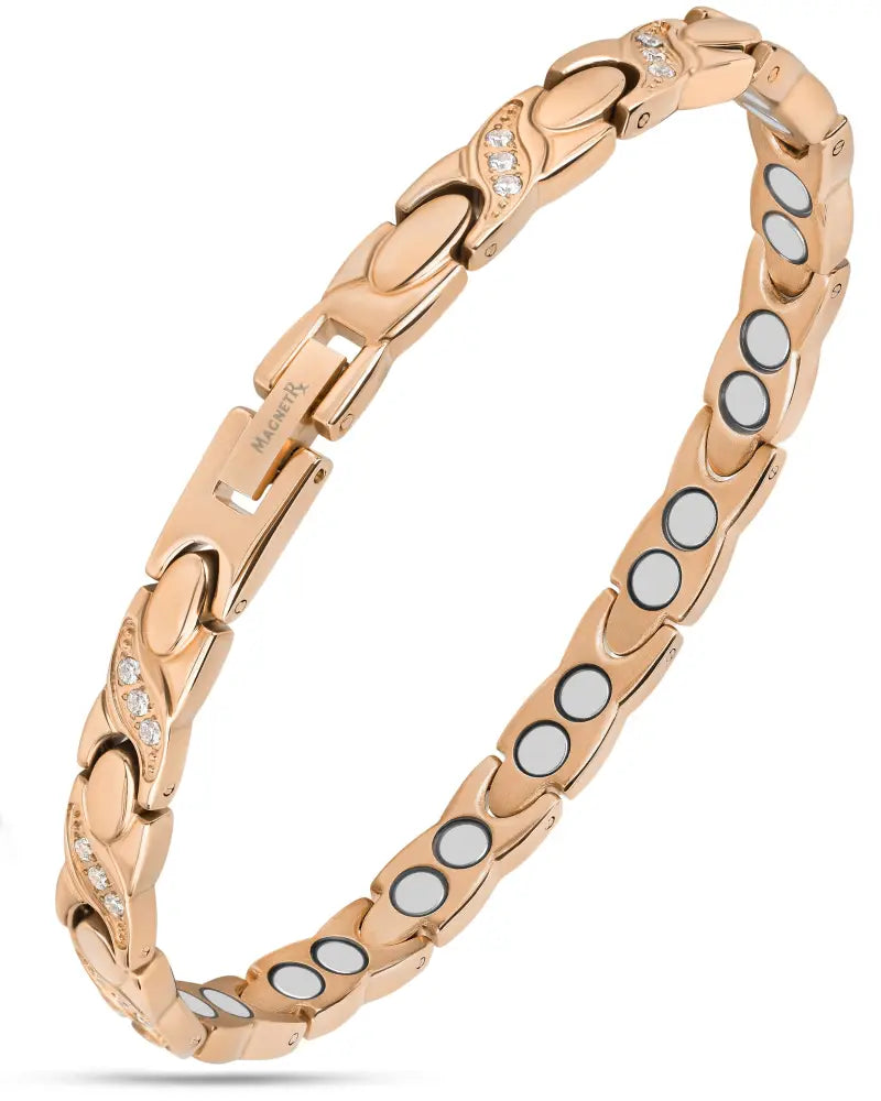 Women’s rose gold magnetic xo link bracelet with clear crystals and circular white magnets embedded in the design