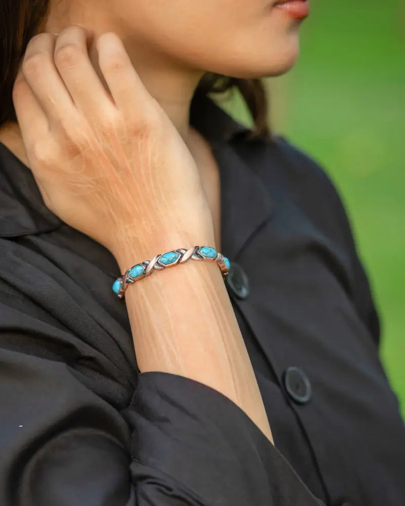 Women’s ultra strength pure copper turquoise magnetic bracelet with silver-toned twisted design and vibrant turquoise stones