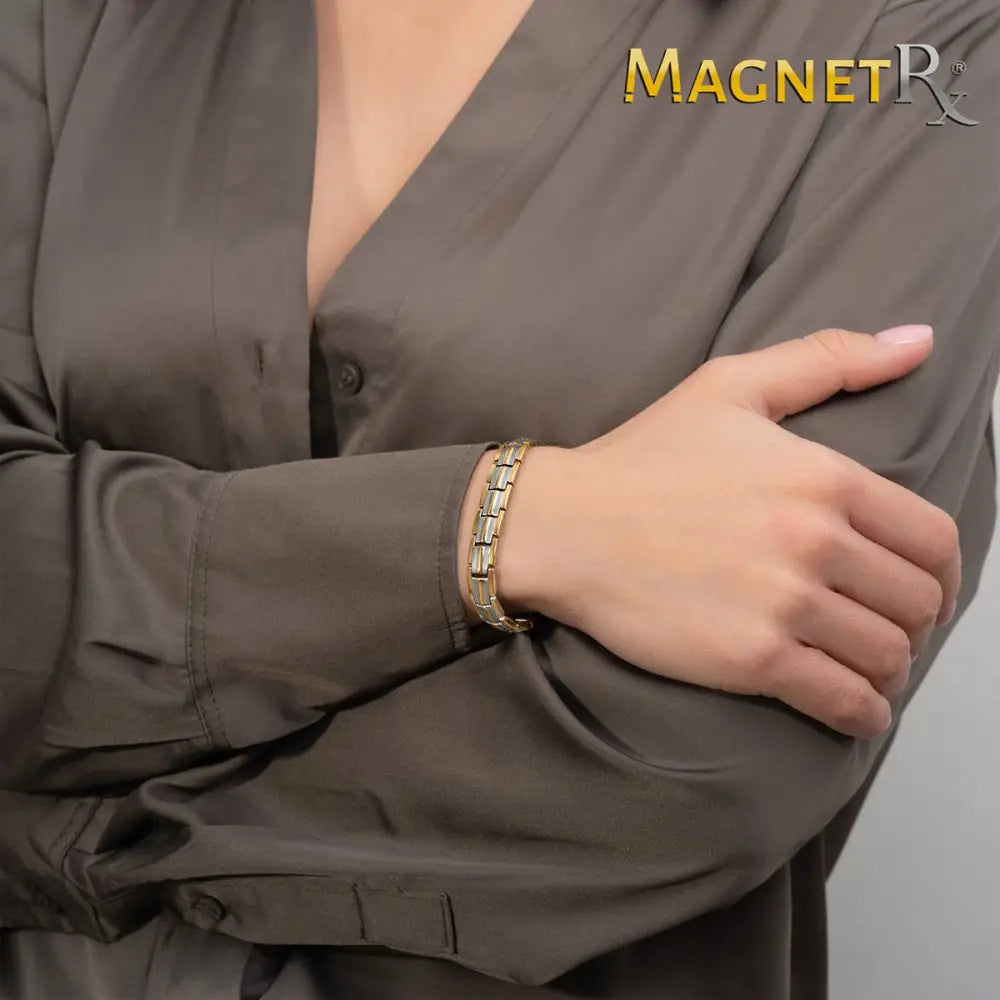 Two tone titanium ultra strength magnetic bracelet with sleek gold and silver interlocking link design