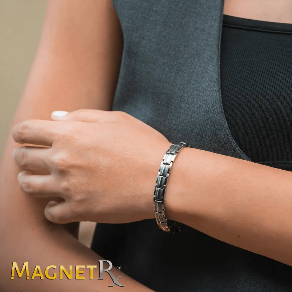 Magnetrx women’s silver titanium magnetic therapy bracelet with sleek segmented design and polished metallic finish