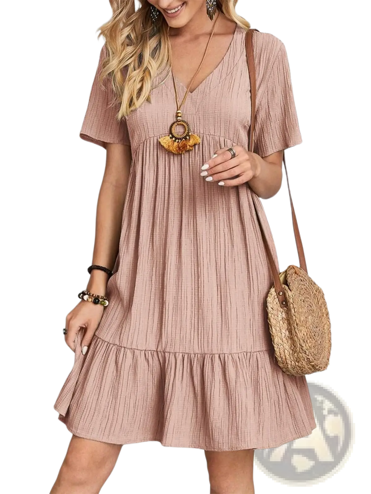 A soft dusty rose-colored women’s v-neck tiered pleated summer dress with vertical pleats and short sleeves