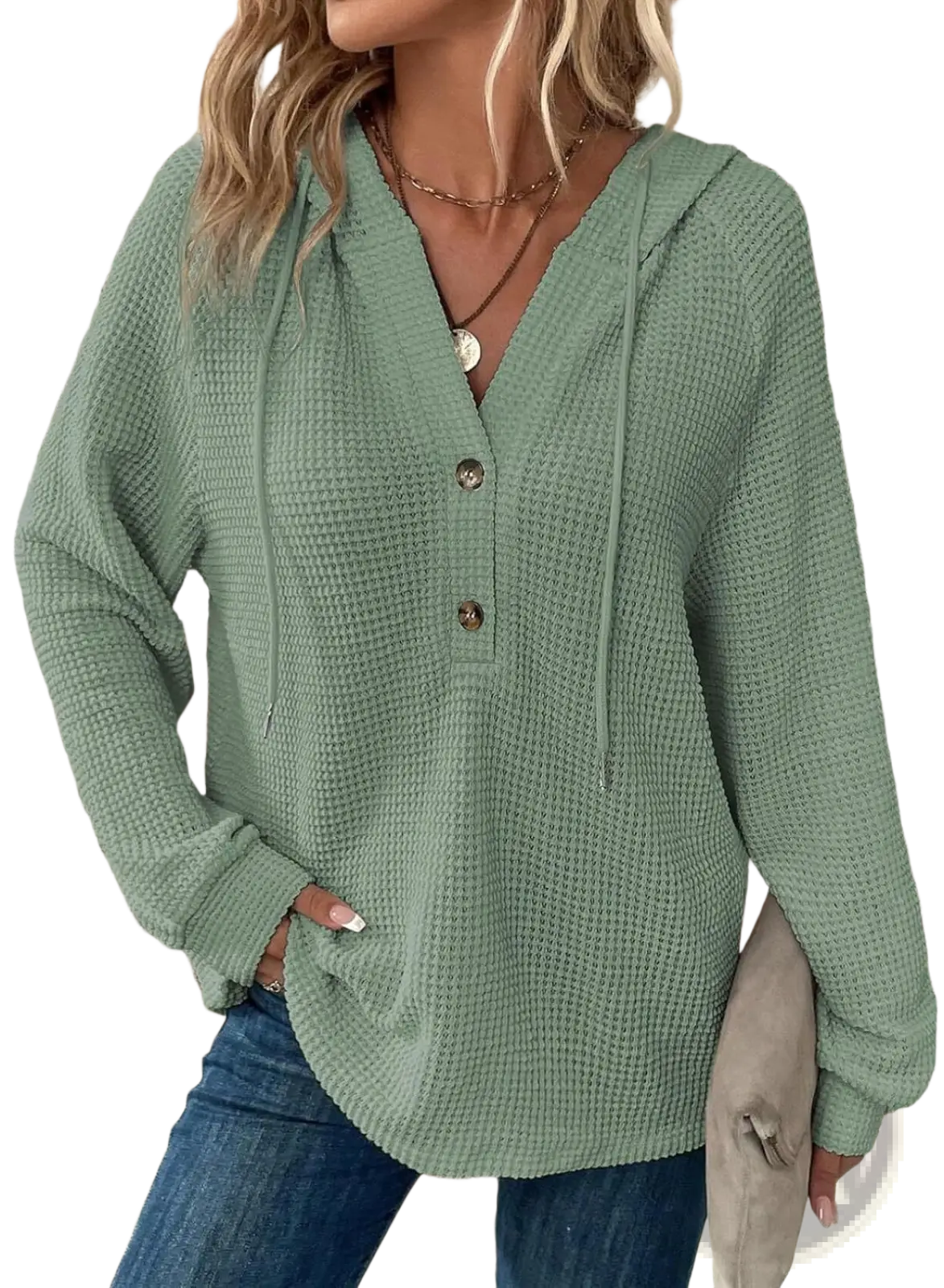 A soft sage green waffle knit women’s v neck hoodie sweater with three buttons and hood drawstrings
