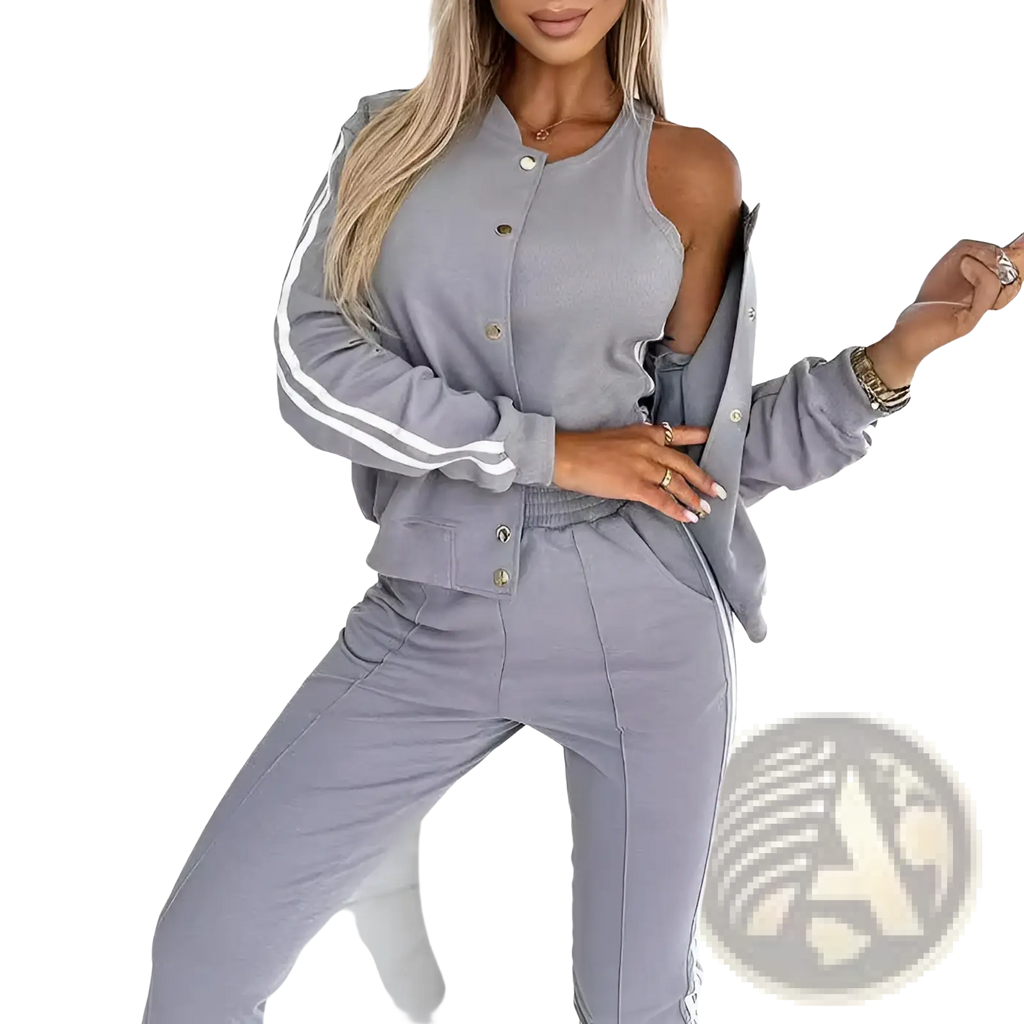 Gray women’s varsity button up jogger set in athletic fabric with white stripe detailing on sleeves and pants