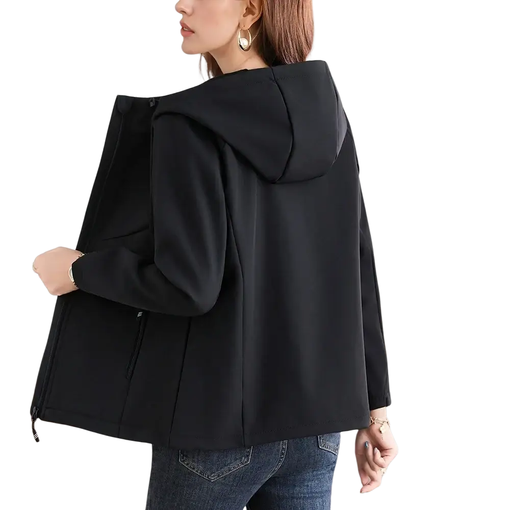 Black waterproof fleece hiking jacket for women with hood and zippered pockets designed for outdoor use