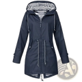 Navy blue womens waterproof raincoat with hood striped interior lining and silver zipper accents lightweight trench jacket