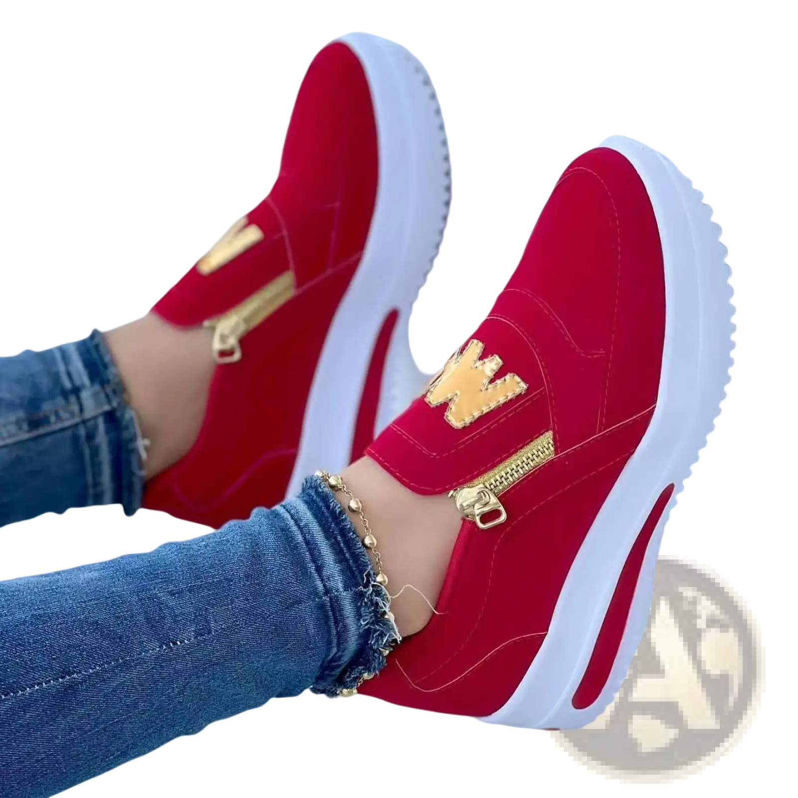 Women’s red wedge slip on sneakers with gold zipper accents and white rubber sole for casual wear