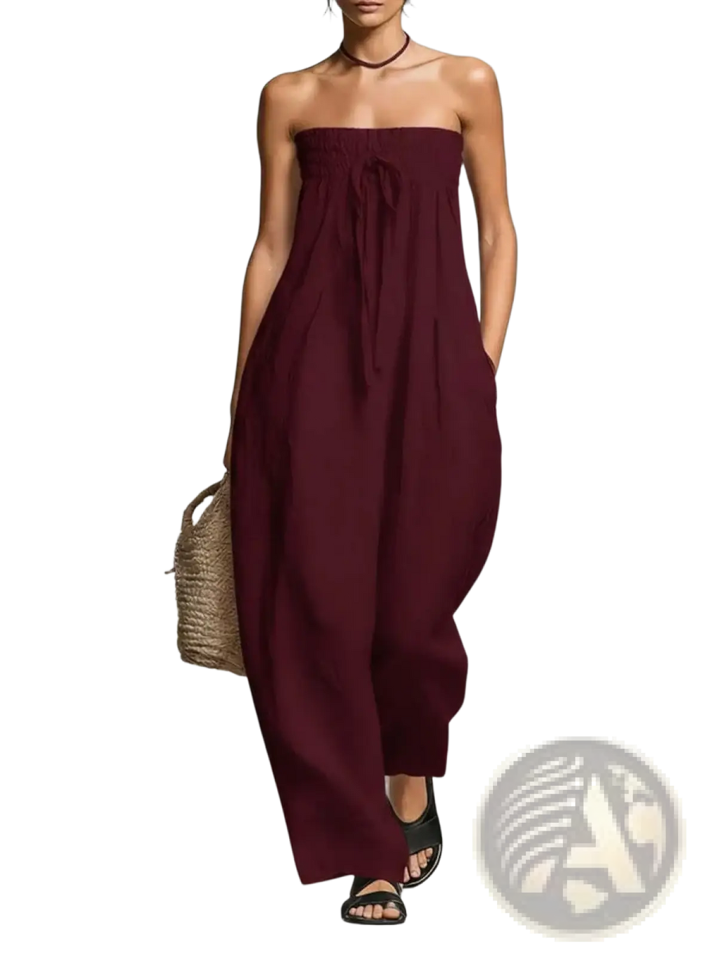 A flowing strapless maroon wide leg summer jumpsuit with a gathered waist for women