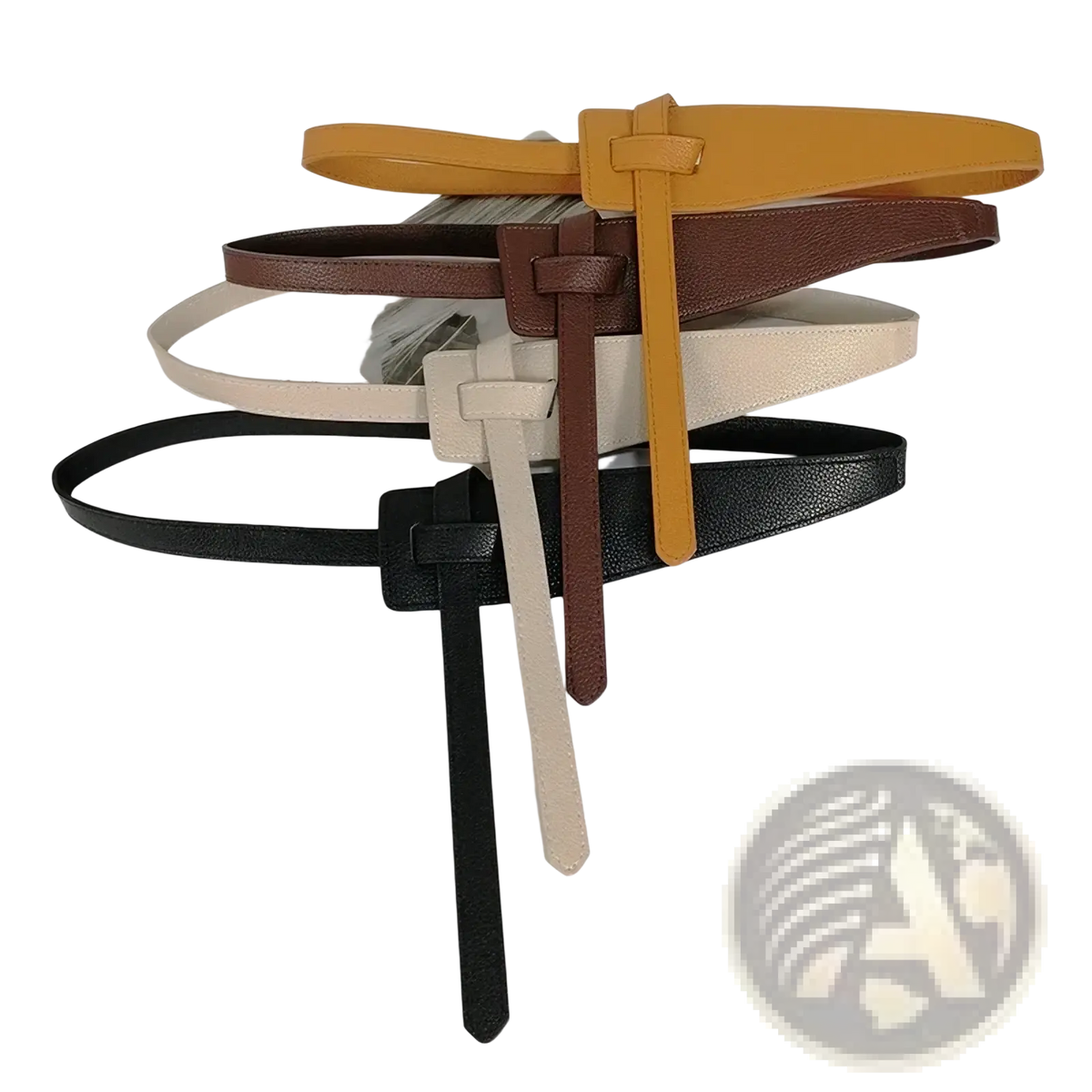A collection of women’s wide pu leather knot waist belts in mustard yellow brown beige and black minimalist flat style