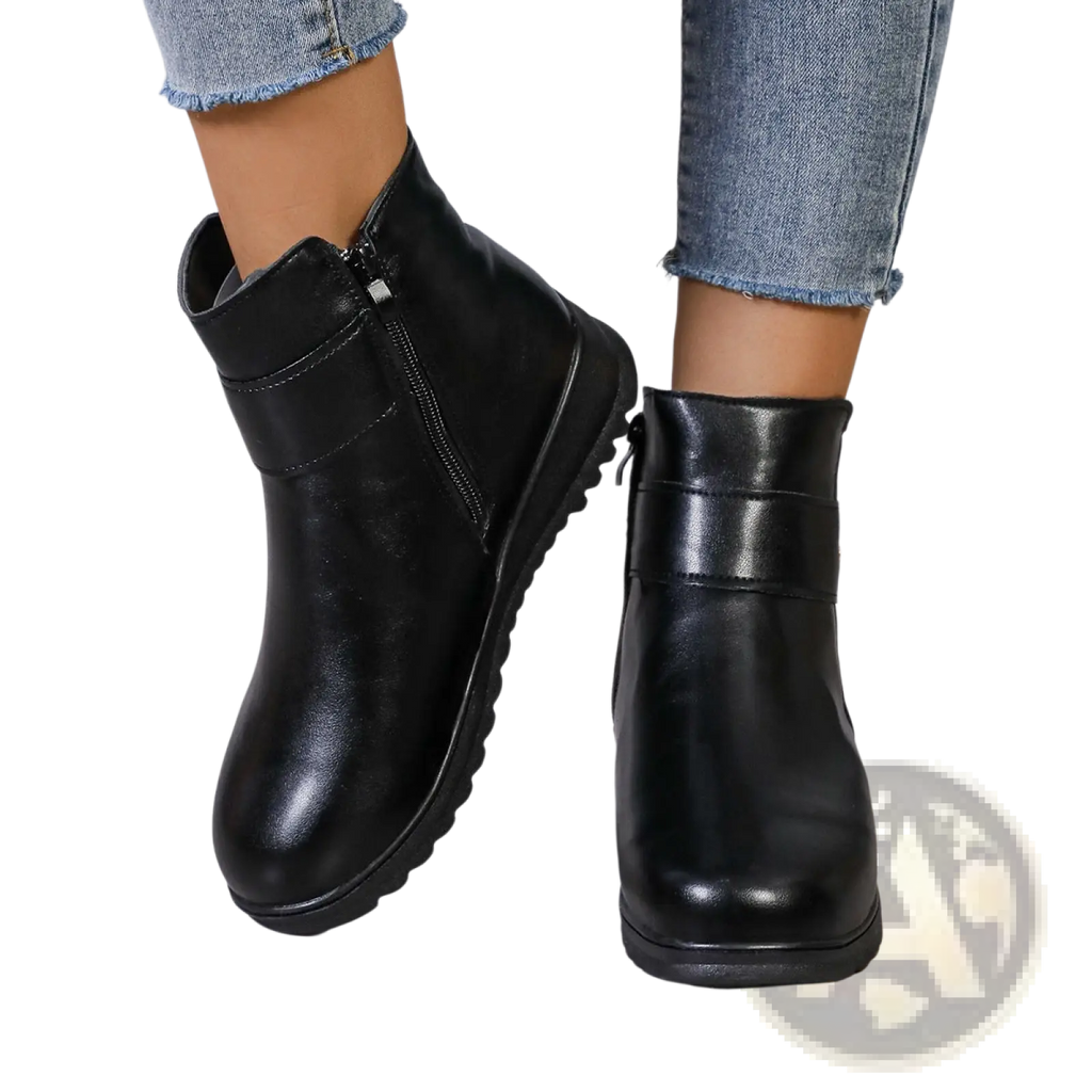 Black leather women’s winter fleece ankle boots with inner side zipper and thick textured sole for cold weather