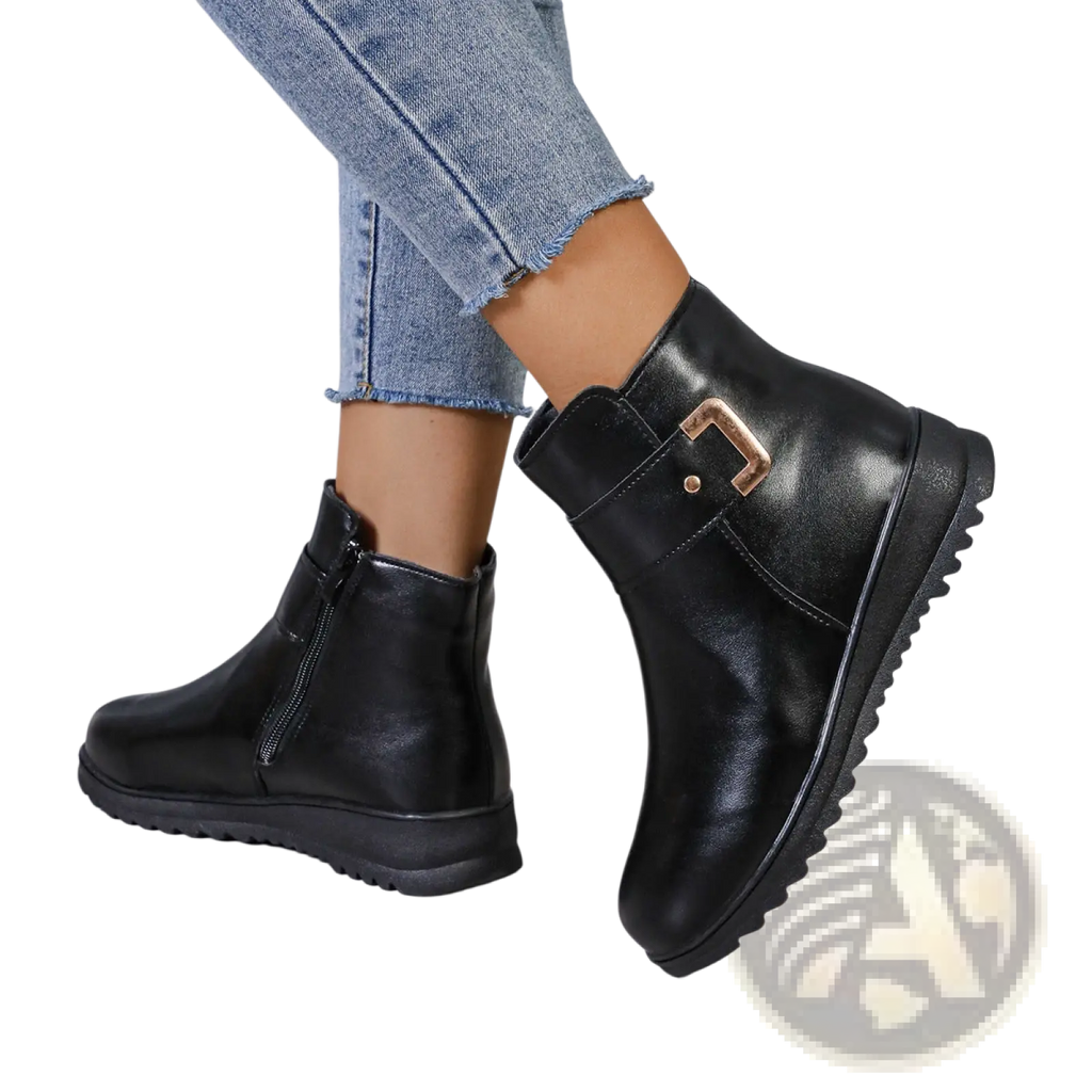 Black leather women’s winter fleece ankle boots with gold-tone buckle and zipper closure