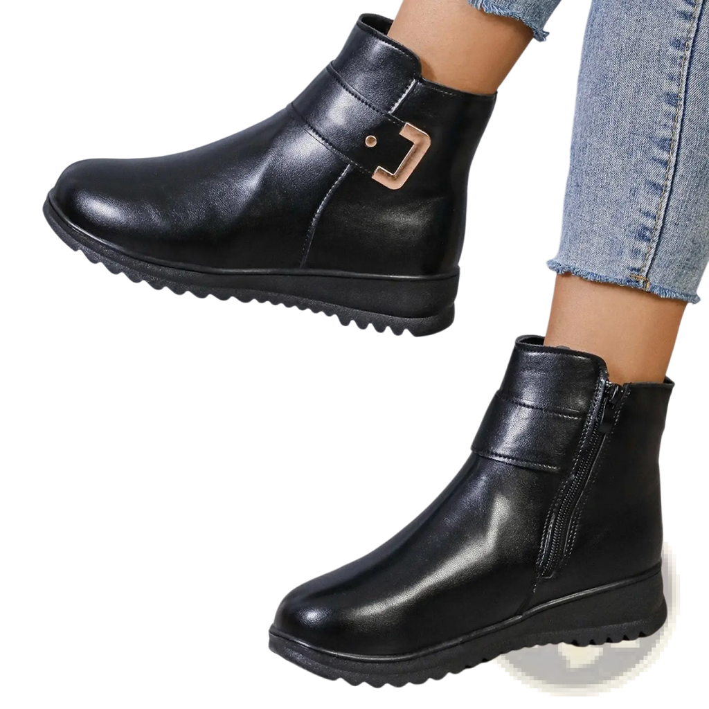 Black leather women’s winter fleece ankle boots with gold-tone buckle and zipper closure front view
