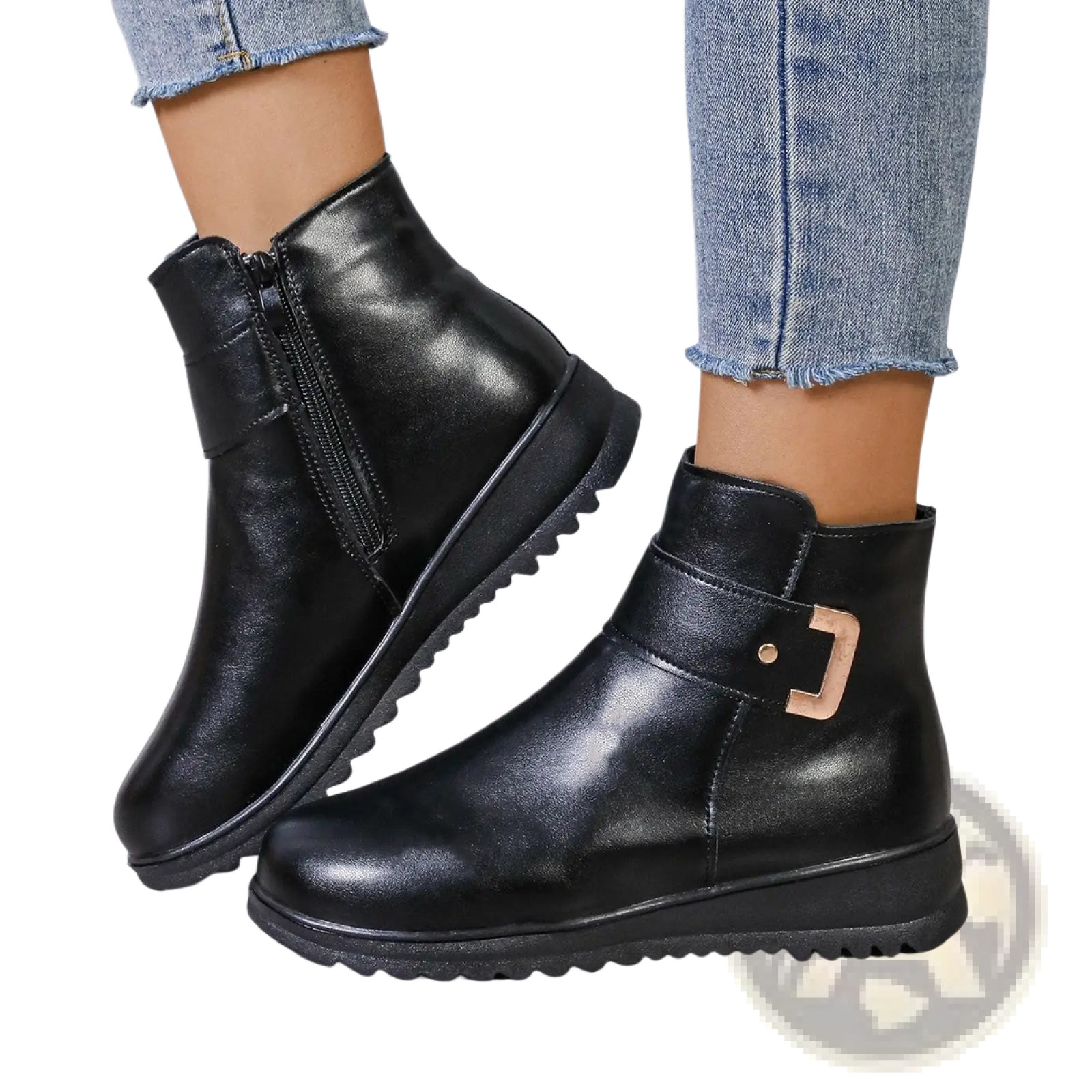 Black leather women’s winter fleece ankle boots with gold-tone buckle and textured rubber sole for cold weather use