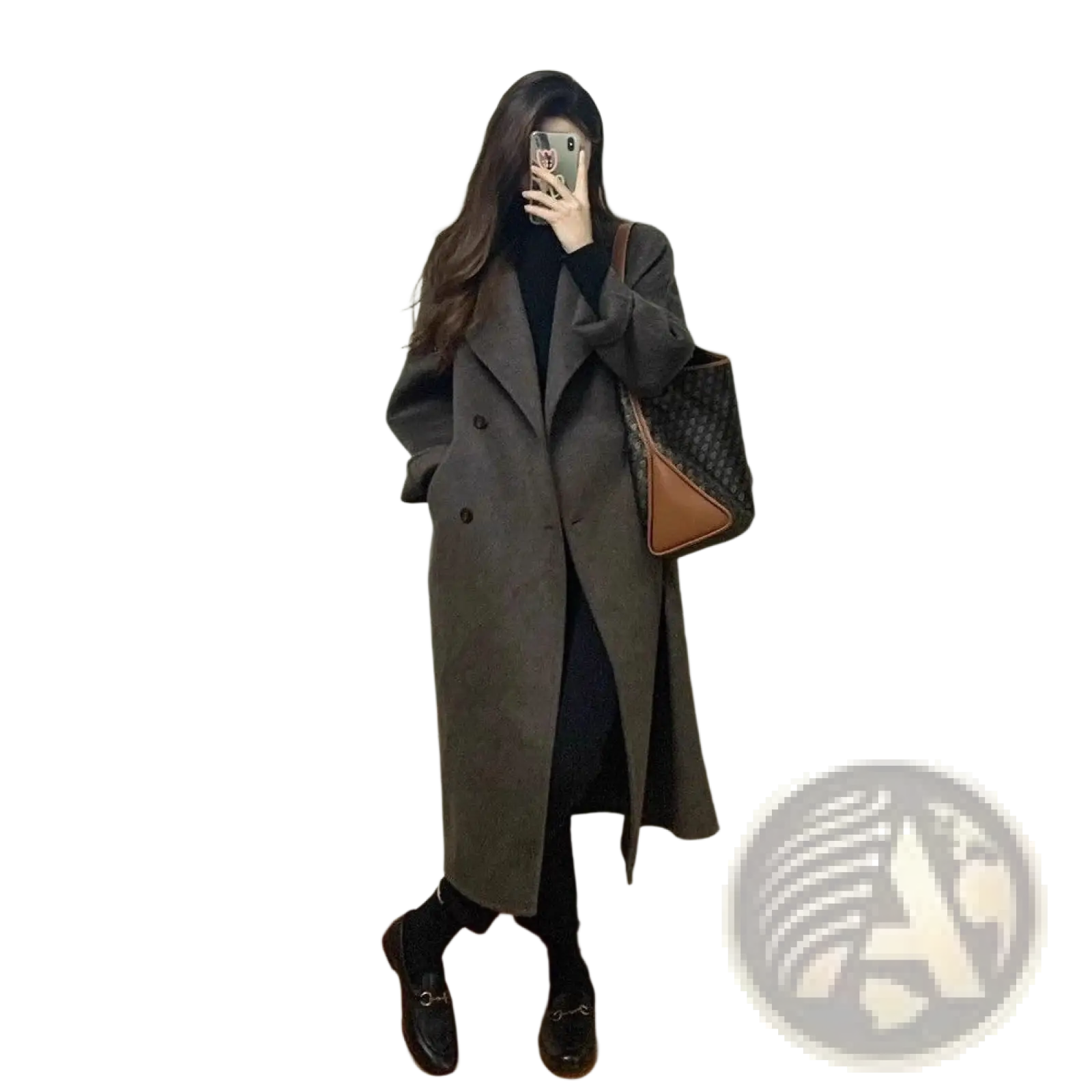 A long dark gray wool women’s double breasted coat with classic notched lapels and tailored design