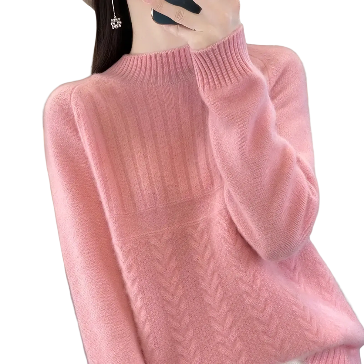 Women’s wool knit pullover sweater in soft pink with long sleeves and intricate cable knit front design