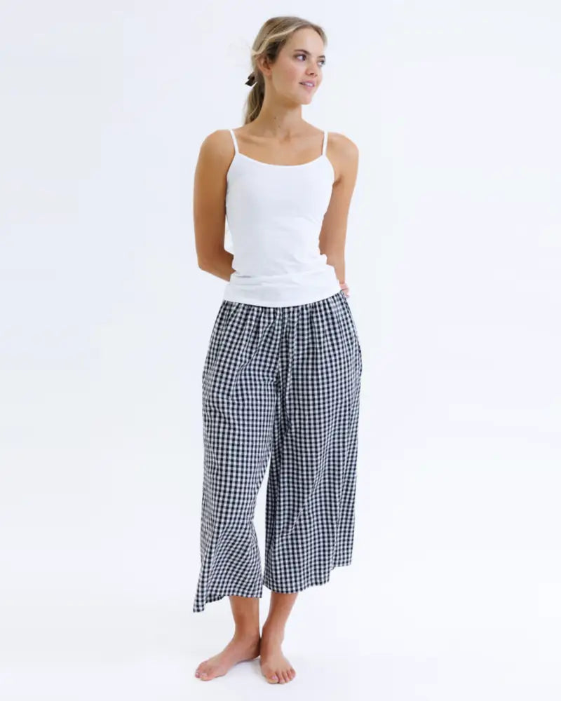 Black and white gingham patterned wide-leg cropped pants styled with a cotton stretch wonder cami layering tank top