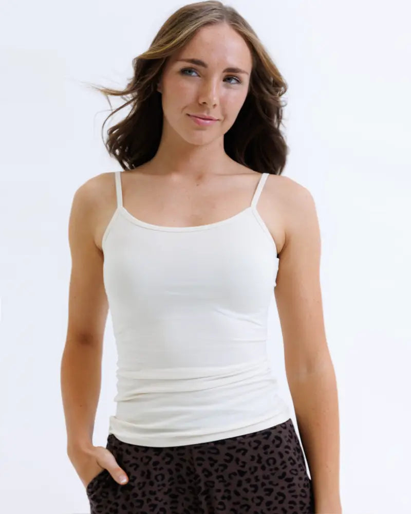 White spaghetti strap cotton stretch layering tank top designed for comfortable everyday wear