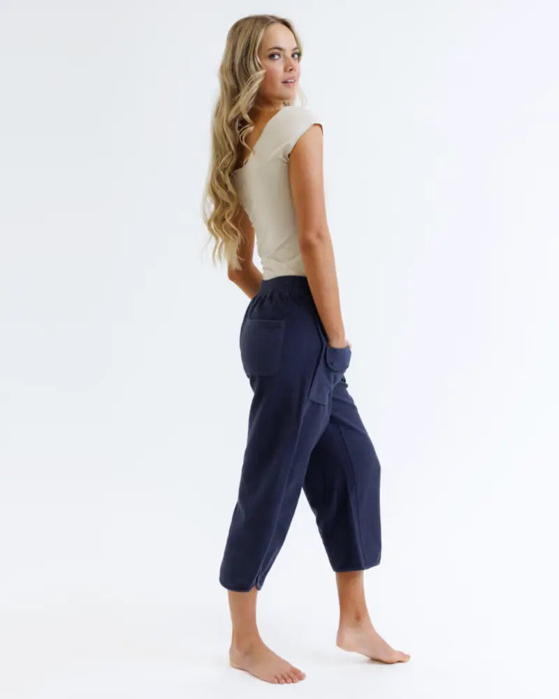 Navy blue cotton capri pants with side pockets and elastic waistband paired with wonder tee cotton scoop neck cap sleeve t-shirt