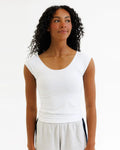White cotton sleeveless top with rounded neckline and subtle ruching at the waist wonder tee cotton scoop neck