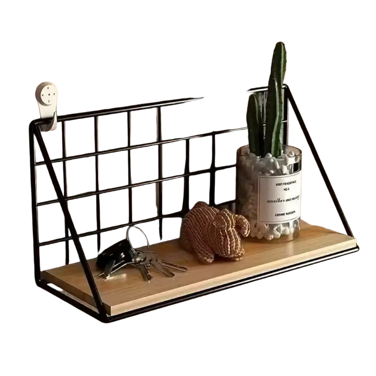 Wood wall shelf with black metal grid wire basket and light wood plank base holding keys and a cactus in glass jar