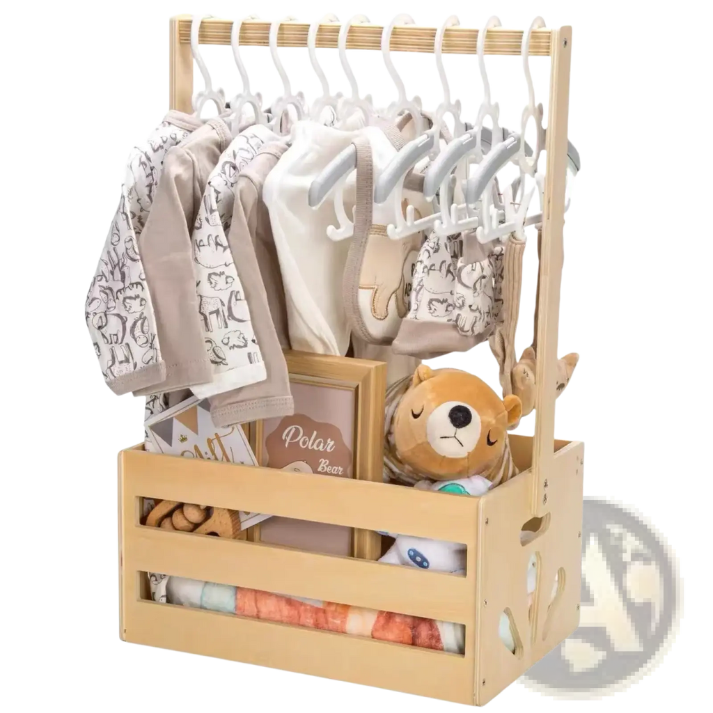 Light wood wooden baby toy storage crate and clothing organizer with white hangers holding neutral onesies and a plush bear