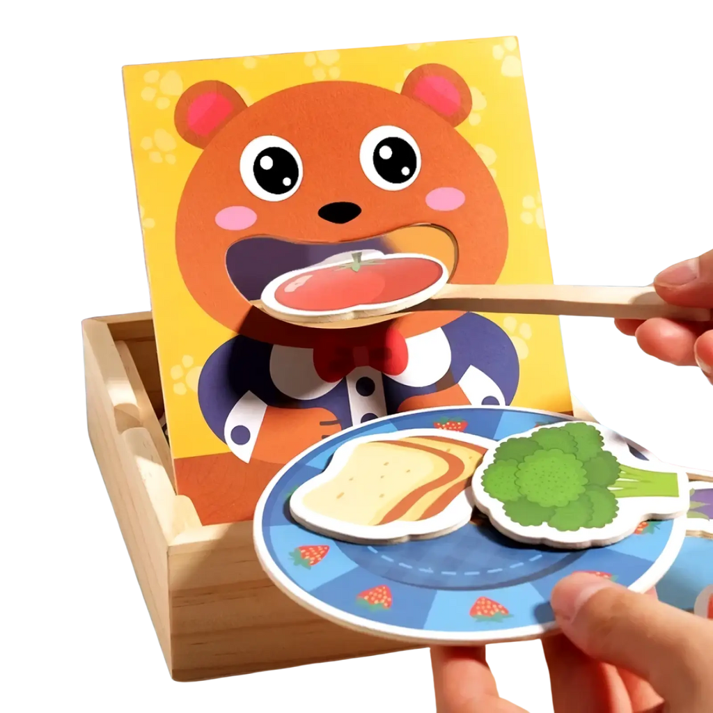 Orange bear-themed wooden feeding game toy with cutout food pieces on a blue plate for interactive play
