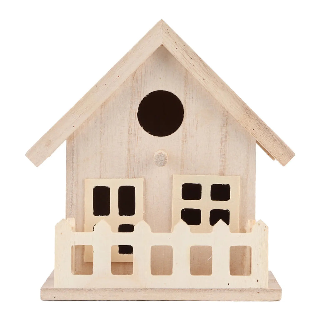 A rustic white wooden bird house with a slanted roof and circular entrance for parrots and small birds