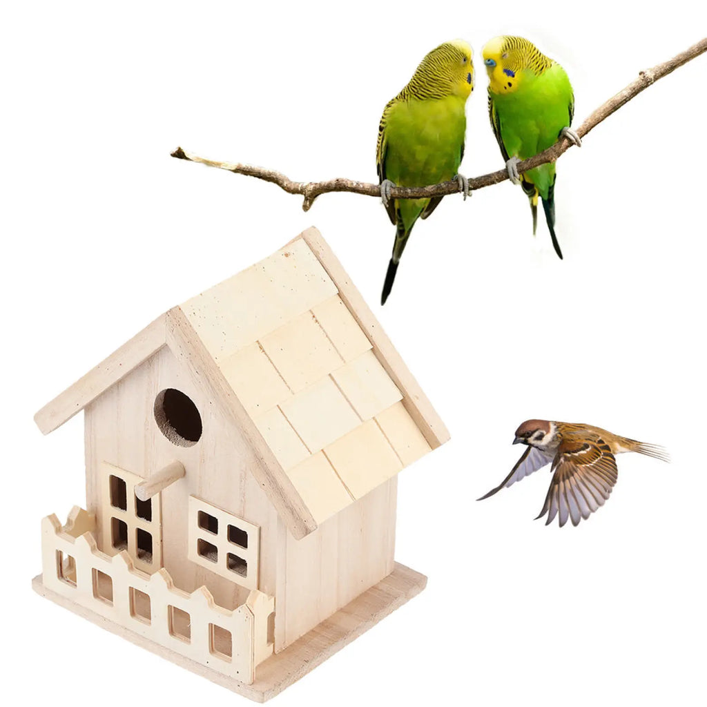A light-colored wooden birdhouse with a slanted roof and circular entrance hole for parrots and small birds