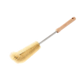 Wooden bottle cleaning brush with long light brown handle and soft pale yellow bristles for thorough cleaning