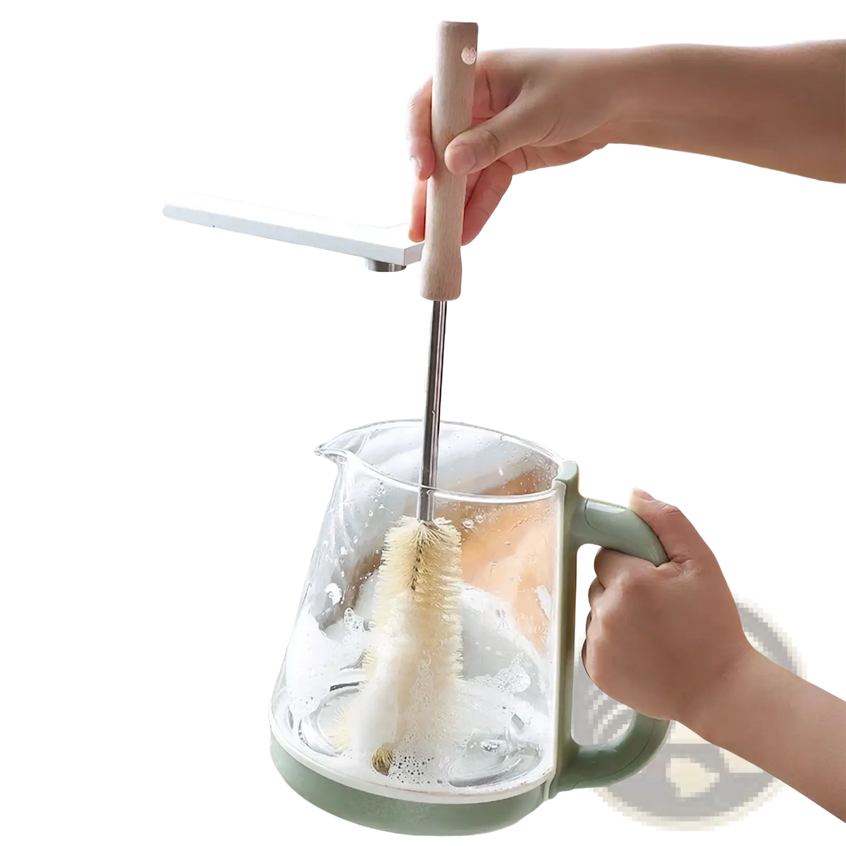 A wooden bottle cleaning brush with a long wooden handle and bristles cleaning a clear glass kettle with a green handle