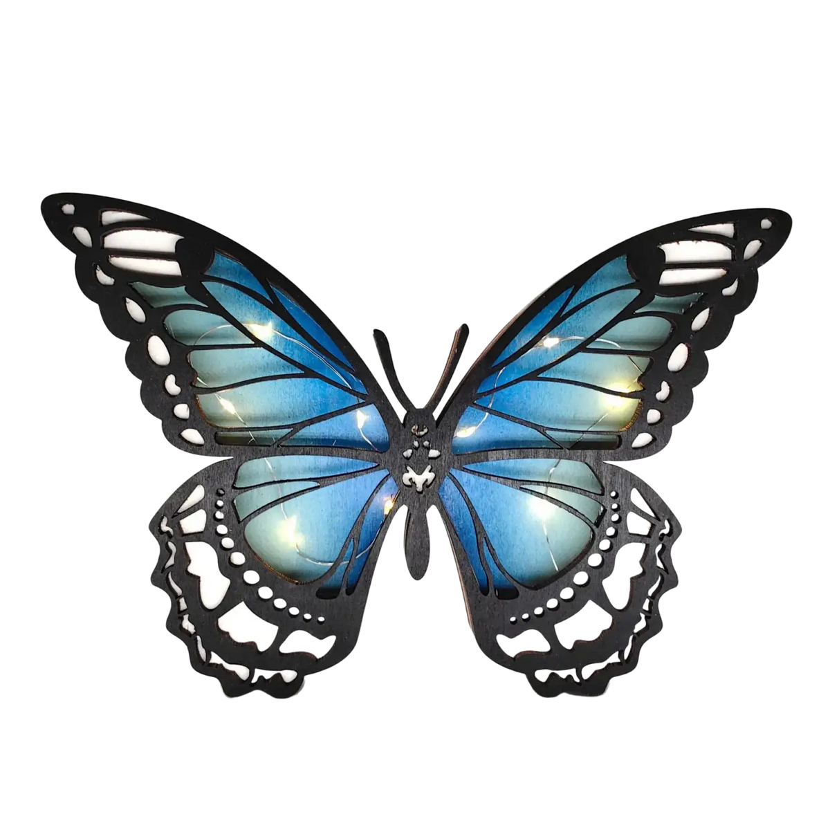 Blue butterfly-shaped wooden LED light with black frame and illuminated wings for tabletop decor