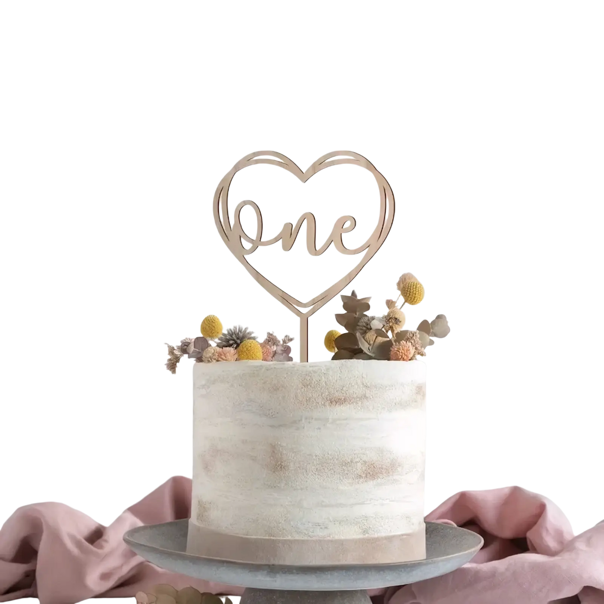 A delicate gold heart-shaped wooden one cake topper with floral birthday decoration in elegant cursive script