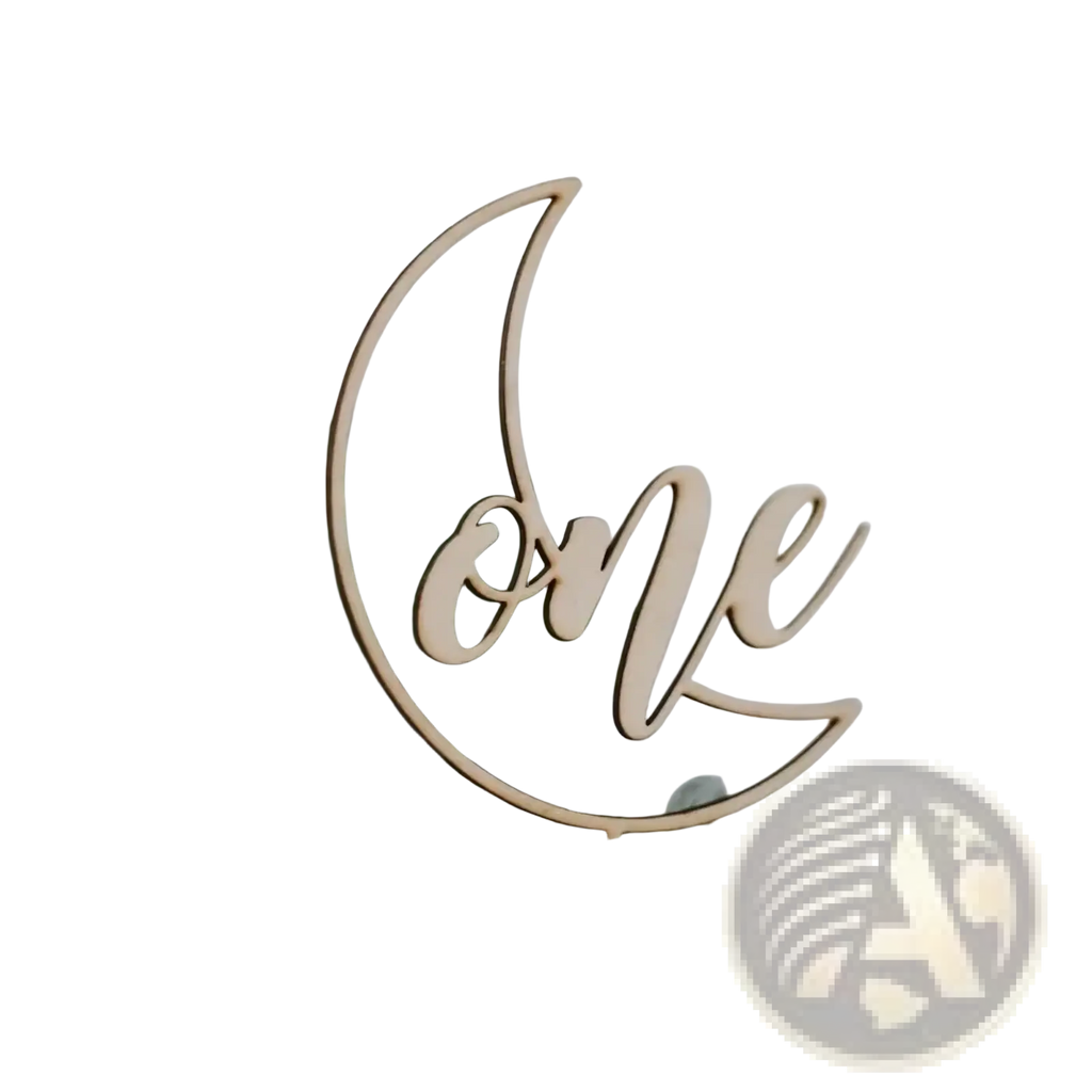 Wooden one cake topper featuring a delicate light wood crescent moon with the word one in cursive script